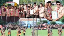 Walikota Sungai Penuh, Alfin, SH, menyematkan tanda penghargaan kepada Pramuka Garuda pada Apel Besar Hari Pramuka ke-64 di Lapangan Merdeka.