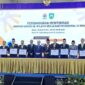 Walikota Sungai Penuh, Alfin, SH menandatangani komitmen meritokrasi bersama BKN RI di Palembang, Rabu (10/9).