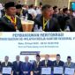 Bupati Kerinci Monadi menandatangani komitmen meritokrasi bersama kepala daerah se-wilayah kerja BKN Palembang, Rabu (10/9/2025).