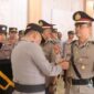 Kapolres Kerinci AKBP Arya Tesa Brahmana saat memimpin upacara serah terima jabatan Kabag Ops Polres Kerinci, Selasa (21/10/2025).
