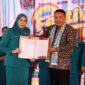 Wali Kota Sungai Penuh, Alfin, SH, bersama Bunda Literasi Kota Sungai Penuh, Sri Kartini Alfin, S.Kep., NS, saat pembukaan Festival Literasi Kota Sungai Penuh 2025.