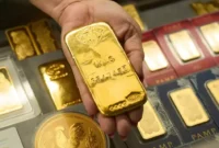 Pergerakan harga emas dunia yang masih berfluktuasi di tengah tekanan pasar dan sentimen global.