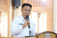Sekda Sungai Penuh Alpian saat membuka kegiatan seleksi Paskibraka Tahun 2026 di Aula Kantor Wali Kota Sungai Penuh.