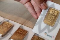 Ilustrasi emas batangan Antam dengan harga terbaru yang mengalami kenaikan pada perdagangan hari ini.