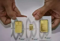 Ilustrasi emas batangan berbagai merek yang dijual di Pegadaian, dengan harga kompak turun pada 17 Mei 2026.