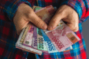 Ilustrasi transaksi Local Currency Transaction (LCT) yang digunakan Indonesia dalam perdagangan internasional tanpa melalui dollar AS. (Fhoto : Shutterstock/Travis182)