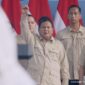 Prabowo Subianto berpidato saat peringatan Hari Buruh 2026 di Monas, Jakarta, menyoroti potongan tarif ojol