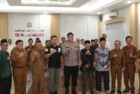 Petugas Densus 88 bersama pemerintah daerah saat sosialisasi penerapan kotak amal berbasis QR barcode di Aula Mapolres Kerinci, Selasa (12/5/2026).