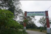 Gapura masuk Desa Wisata Benteng di Ciampea, Bogor, yang dikenal dengan Kampung Cassava.(Foto: Alfi Kholisdinuka/detikcom)
