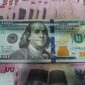 Ilustrasi dolar AS dan rupiah yang menunjukkan pergerakan nilai tukar di pasar keuangan.(Ilustrasi/Foto: Gilang Faturahman/detikfoto)