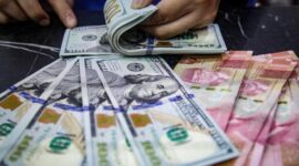 Gubernur Bank Indonesia Perry Warjiyo menyampaikan kebijakan terbaru pembatasan pembelian dolar AS dalam konferensi pers Rapat Dewan Gubernur, Jakarta, Kamis (18/6/2026).(Foto: Andhika Prasetia/detikFoto)