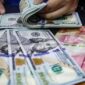Gubernur Bank Indonesia Perry Warjiyo menyampaikan kebijakan terbaru pembatasan pembelian dolar AS dalam konferensi pers Rapat Dewan Gubernur, Jakarta, Kamis (18/6/2026).(Foto: Andhika Prasetia/detikFoto)