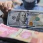 Pergerakan rupiah menguat terhadap dolar AS pada perdagangan terbaru didorong kebijakan Bank Indonesia dan pelemahan dolar global ( Foto : CNBC Indonesia/Faisal Rahman)