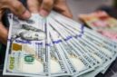 Nilai tukar dolar AS menguat terhadap rupiah usai pengunduran diri Gubernur Bank Indonesia Perry Warjiyo.(Foto: Andhika Prasetia/detikFoto)