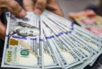 Nilai tukar dolar AS menguat terhadap rupiah usai pengunduran diri Gubernur Bank Indonesia Perry Warjiyo.(Foto: Andhika Prasetia/detikFoto)