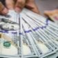 Nilai tukar dolar AS menguat terhadap rupiah usai pengunduran diri Gubernur Bank Indonesia Perry Warjiyo.(Foto: Andhika Prasetia/detikFoto)