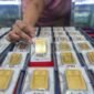 Harga emas Antam terpantau stagnan meski tensi geopolitik di Timur Tengah meningkat.(Foto: ANTARA FOTO/RAISAN AL FARISI)