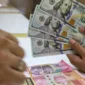 Rupiah melemah terhadap dolar AS.(Foto : Liputan6.com/Angga Yuniar)