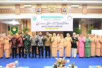 Hutri Randa menghadiri pengukuhan pengurus DWP Sungai Penuh.