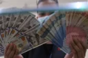 Rupiah kembali melemah terhadap dolar AS pada penutupan perdagangan Senin, 14 September 2026. (Foto : Liputan6.com/Angga Yuniar) 
