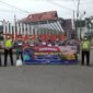Ketua SMSI Kerinci-Sungai Penuh bersama Satlantas Polres Kerinci dan RRI Sungai Penuh membagikan masker gratis kepada pengendara di Kota Sungai Penuh, Kamis (10/9/2026).