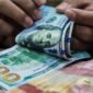 Dolar AS melemah terhadap rupiah pada perdagangan Jumat (4/9/2026) ke level Rp17.631.(Ilustrasi/Foto: Andhika Prasetia/detikFoto)