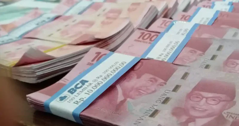 Rupiah masih menghadapi tekanan akibat konflik Iran-AS, harga minyak, dan kebijakan The Fed.(Foto : WARTA KOTA/HENRY LOPULALAN/tribunnews.com)
