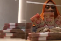 Rupiah menguat ke Rp17.896 per dolar AS pada pembukaan perdagangan Jumat, 9 Oktober 2026.(Foto : Liputan6.com/Angga Yuniar)