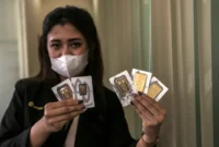 Harga emas Antam ukuran 1 gram mencapai Rp2.592.000 pada Sabtu (10/10/2026), naik Rp12.000 dibandingkan awal pekan.(Foto : Liputan6.com/Johan Tallo)