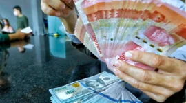 Rupiah melemah ke Rp18.080 per dolar AS pada penutupan perdagangan Jumat (23/10/2026).