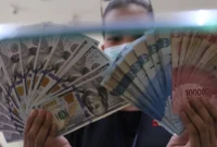 Rupiah menguat ke Rp18.015 per dolar AS pada pembukaan perdagangan Selasa (20/10/2026). (Foto : Liputan6.com/Angga Yuniar)