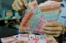 Rupiah melemah ke Rp18.035 per dolar AS seiring tekanan pasar global dan kenaikan harga minyak.(Foto : Liputan6.com/Angga Yuniar)
