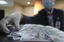 Rupiah menguat ke Rp18.123 per dolar AS setelah investor merespons sinyal dovish The Fed.(Foto : Liputan6.com/Angga Yuniar)