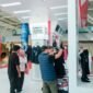 Pertamina mempromosikan produk UMKM lokal Lombok melalui booth MyPertamina dalam ajang Pertamina Grand Prix of Indonesia 2026 di Sirkuit Mandalika.(Foto dok Pertamina)